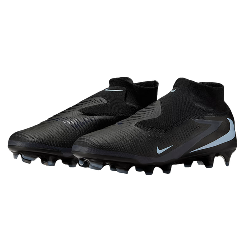 Pair of black laceless Nike soccer cleats with light blue accents and a textured upper on a black background.