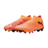 Vibrant orange Puma soccer cleats with pink and black accents, featuring a mid-cut collar and textured upper on a solid black background.