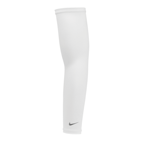 A white Nike compression arm sleeve with a small silver swoosh logo near the wrist, set against a solid black background.