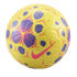 Yellow Nike soccer ball featuring purple and pink geometric patterns and a prominent pink swoosh logo against a black background.