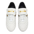 Top-down view of white Diadora soccer cleats with quilted uppers and gold branding on large fold-over tongues, against a black background.