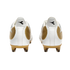 Rear view of two white and gold Diadora soccer cleats with black logos on the heels, set against a black background.