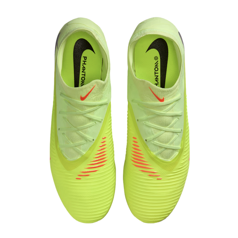 Top-down view of neon yellow Nike Phantom soccer cleats with orange accents on a black background.
