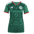 A green Mexico national football team jersey featuring a prominent Aztec-inspired sun stone graphic, white Adidas logo, and team crest with red and white trim.