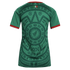 Back view of a green Mexico soccer jersey featuring an intricate dark green Aztec pattern, red and white sleeve trim, and a small "SOMOS MEXICO" logo at the neck.