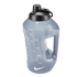 A grey semi-transparent Nike water jug with a black lid, integrated handle, and volume markings on the side.