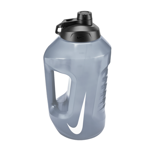 A translucent grey Nike water jug with a built-in handle, a black flip-top cap, and a large white swoosh logo on the front.