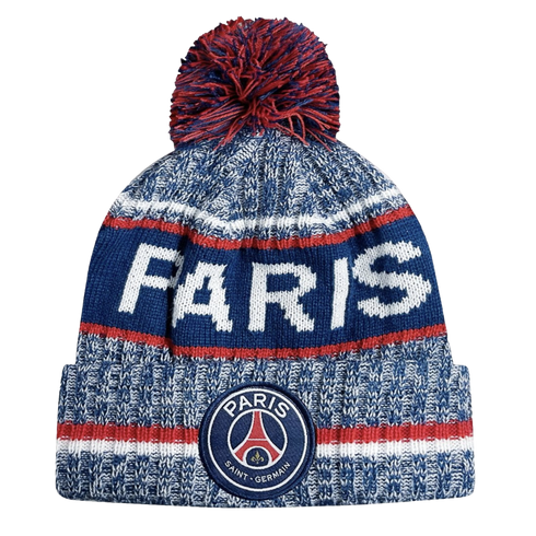 Blue, white, and red Paris Saint-Germain knit beanie with a pom-pom. The word "PARIS" is knitted across the middle, and the PSG team crest is featured on the front cuff.