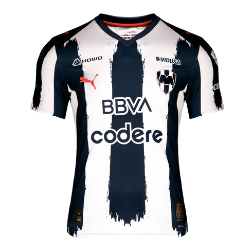 Monterrey home soccer jersey featuring white and navy blue brushstroke stripes, the team crest, a red Puma logo, and sponsors BBVA and Codere.