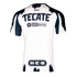 Back view of a white and navy Rayados soccer jersey with Tecate, Oxxo Gas, and H-E-B logos and a brushstroke pattern along the edges.