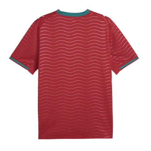 Back view of a red short-sleeve jersey featuring a horizontal wavy pattern, green trim on the collar and sleeve cuffs, and white logos on the shoulders.