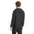 Rear view of a person wearing a black hooded athletic jacket and matching pants against a plain black background.