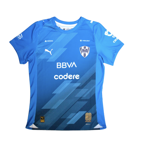 Blue C.F. Monterrey soccer jersey with diagonal line patterns, white sponsor logos for BBVA and Codere, and a gold 80th-anniversary badge.