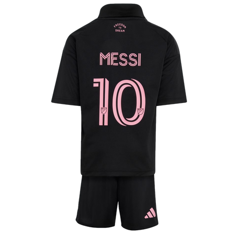 Back view of a black soccer kit with pink lettering. The jersey features the name "MESSI" and number "10". The matching shorts have a pink Adidas logo.