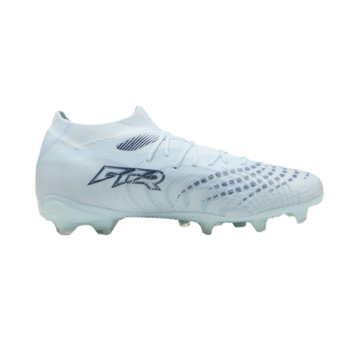 A light blue and white soccer cleat featuring a textured upper and "FTR" branding, shown in side profile against a black background.
