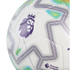 Close-up of a white Premier League soccer ball featuring the purple lion logo, geometric zig-zag patterns, and vibrant green and blue accents on its textured surface.
