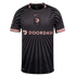 Nike Angel City FC jersey in black with a pink sunburst pattern, featuring the team's shield and DoorDash sponsor logo on the chest.