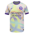 Orlando Pride jersey with a pale yellow base and pastel ribbon patterns. Features a purple collar, Nike logo, team crest, and "ORLANDO HEALTH" sponsor logo.