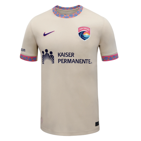 San Diego Wave FC off-white soccer jersey with a colorful patterned collar, team crest, and Kaiser Permanente sponsor logo.