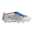 Side profile of a white Adidas Predator soccer cleat with black stripes, a blue fold-over tongue, and red accents against a solid black background.