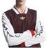 Man wearing an Adidas long-sleeve jersey with a dark, patterned 'AFC' torso, white sleeves featuring gothic 'P+AFC' text, red cuffs, and a striped V-neck collar.