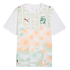 White Puma Côte d’Ivoire soccer jersey featuring a green and orange tropical pattern with palm trees, sunbursts, and the national team crest.