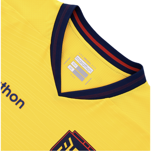 A close-up view of the collar and upper chest of a yellow textured athletic jersey with a navy and red V-neck, featuring "marathon" branding and sizing labels inside the neck.