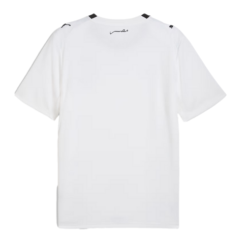 A white short-sleeved t-shirt shown from the back against a black background, featuring small black Puma logos on the shoulders and a small black Arabic word below the neckline.