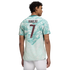 A man seen from behind wearing a light teal and white patterned Portugal soccer jersey with "RONALDO" and the number "7" printed in maroon on the back.