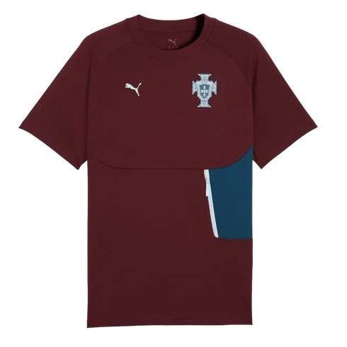 A burgundy Puma short-sleeved t-shirt with the Portuguese Football Federation crest on the left chest and a teal side panel on the right.