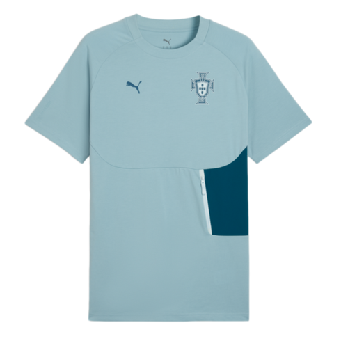 A light blue, short-sleeved Puma sports t-shirt featuring the Portugal national team crest on the left chest and a dark blue Puma logo on the right. It includes a dark teal side panel on the lower right with a vertical white zipper.
