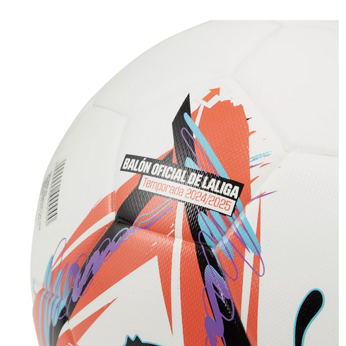 A close-up of a white soccer ball with vibrant orange-red, black, purple, and blue graphics. Text on its surface reads "BALÓN OFICIAL DE LALIGA" and "Temporada 2024/2025."