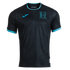 A black Honduras national football team soccer jersey by Joma, featuring bright cyan trim on the collar and sleeve cuffs, a textured geometric pattern, and a large cyan "H" crest on the left chest.