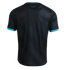 The back view of a black short-sleeved soccer jersey with a subtle, repeating geometric pattern. The sleeve cuffs and back of the collar are accented with bright turquoise trim. Centered just below the collar is small turquoise text that reads, "SELECCIÓN