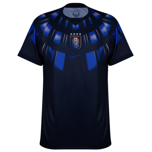 A front view of a navy blue Uruguay national team soccer jersey by Nike against a black background. The jersey features a blue and light blue radial graphic pattern around the neckline and upper chest. The Uruguay (AUF) team crest with four stars is cente