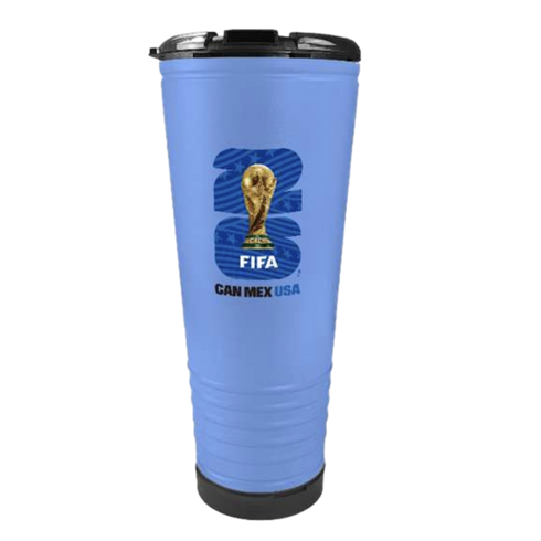 A light blue travel tumbler featuring the FIFA World Cup 2026 logo. The logo depicts a golden trophy over a large blue "26" with white stars and wavy stripes. Beneath the trophy is the word "FIFA" in white, and the text "CAN MEX USA" is printed below in b