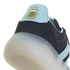 A close-up shot focusing on the heel of an Adidas shoe, featuring a light blue panel with the gold Argentina Football Association (AFA) crest and three stars. Below the blue panel is a dark navy textured material and a thick, semi-translucent white sole,