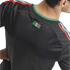 Back view of a black sports jersey with green, white, and red stripes on the shoulders and a "SOMOS MÉXICO" patch at the neck.
