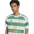 A young man wearing a green and white striped Celtic FC soccer jersey with gold Adidas and Dafabet logos, set against a plain white background.