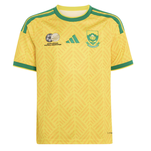 A yellow South Africa national football jersey with green trim, featuring a sublimated hatched pattern, the Adidas logo, SAFA logo, and national team crest.