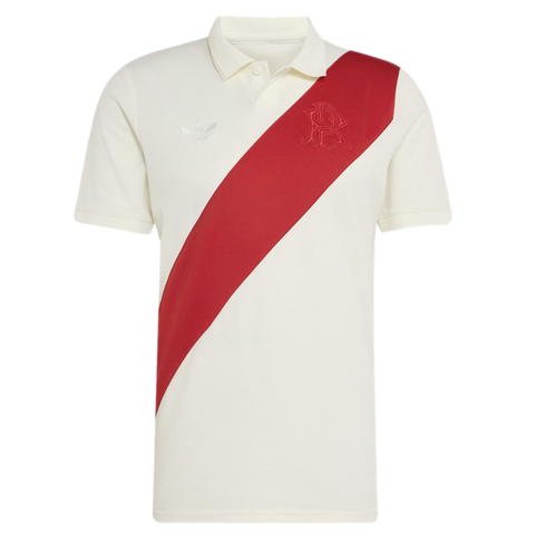 Off-white short-sleeve Adidas polo shirt featuring a prominent red diagonal sash and an embroidered monogram crest.