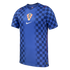 Blue Croatia national football team away jersey by Nike with a checkered pattern on the sides and sleeves, featuring the team crest and white swoosh centered on the chest.