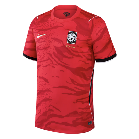 Red Nike South Korea national football team home jersey featuring a tonal tiger stripe pattern, team crest, and white swoosh.