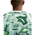 Rear view of a person wearing a Nike top featuring a green and white marbled topographic pattern and white shoulder trim.