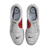 Top-down view of a pair of white Nike Total 90 III soccer shoes with prominent red circular accents featuring the number 90 on the sides.