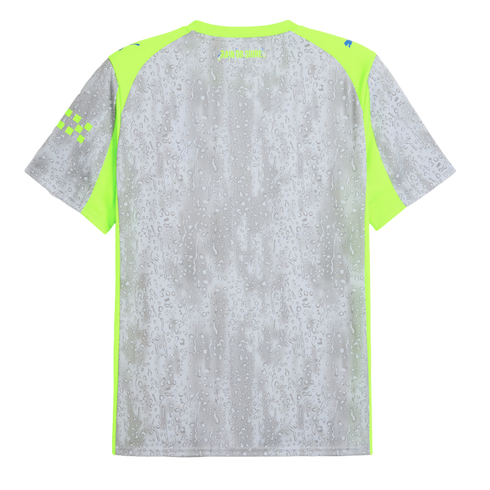 Back view of a grey Puma athletic shirt with a water droplet pattern and lime green accents on the shoulders and sides.