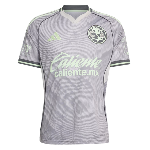 Gray Club América soccer jersey with pale green accents, featuring an abstract diagonal pattern and the "Caliente" sponsor across the chest.