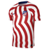 An Atlético Madrid home jersey featuring red and white wavy vertical stripes, a navy Nike swoosh, and the club crest.