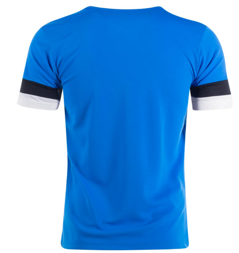 Back view of a bright blue t-shirt with short sleeves featuring horizontal black and white stripes at the cuffs.