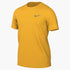 Mustard yellow short-sleeved Nike t-shirt with a grey swoosh logo on the chest.